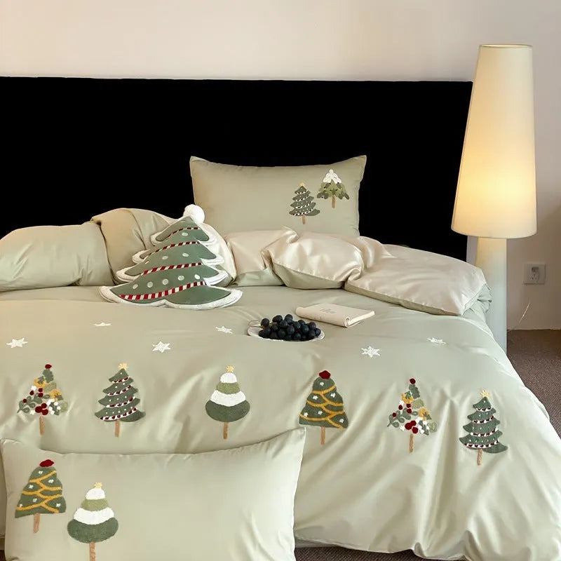 Pure cotton bedding set with Christmas tree embroidery showing duvet cover, sheet, and pillowcases