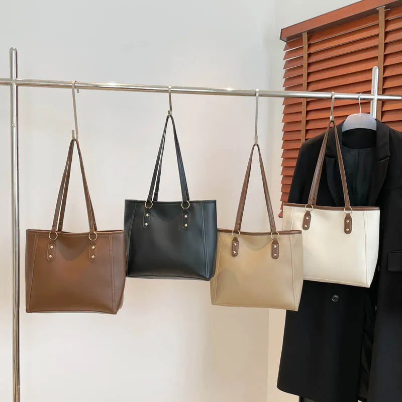 Korean style horizontal square shoulder underarm bag in PU material with a sandwich pocket.
