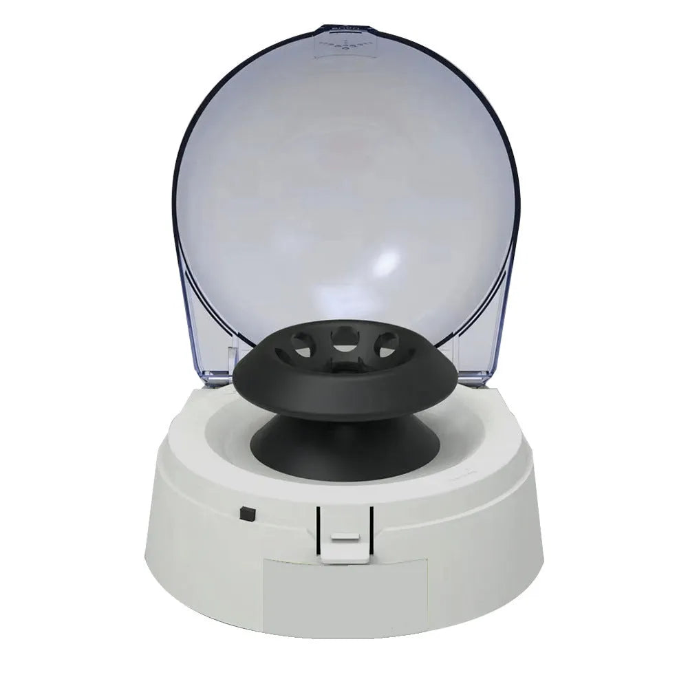 Small white laboratory mini centrifuge unit on a benchtop.