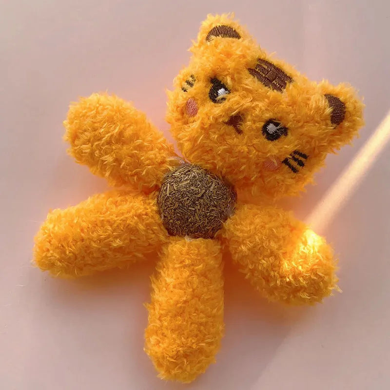 Brown bear shaped stuffed catnip ball edible chewing toy for cats on a white background.