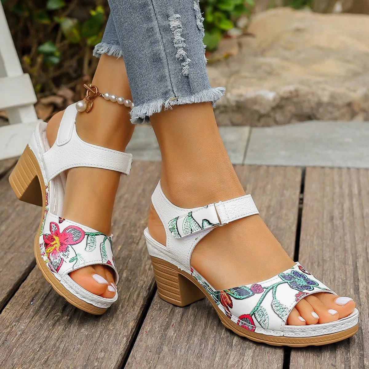 White women's high heel casual sandals with a visible Velcro strap buckle on the instep.
