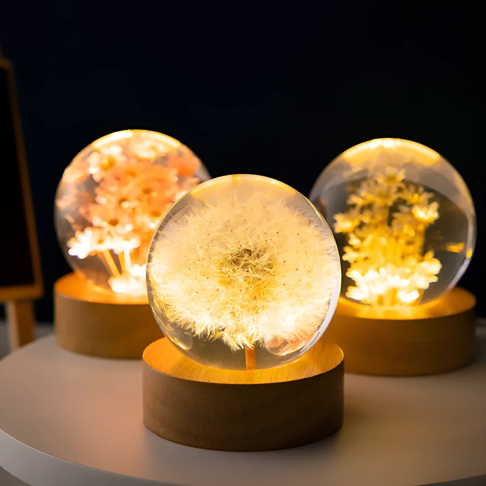 Luminous 3D dandelion in crystal ball on beech wood stand, USB-powered desktop night light.