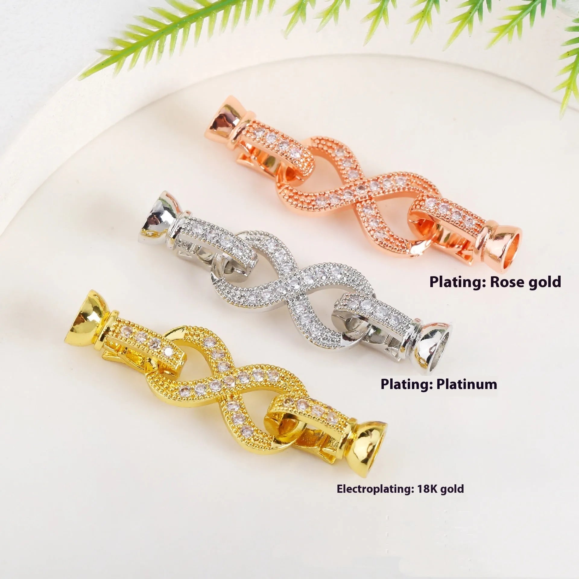 Small gold-coloured jewellery clasp with pearl detail for DIY necklace making
