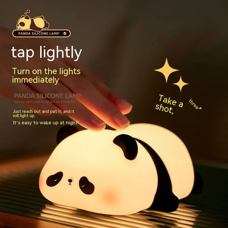 Panda-shaped night light with warm white LED glow and silicone construction