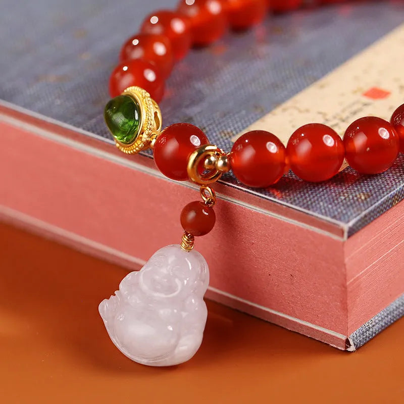 Handcrafted red agate and amber bracelet with geometric design and gold Maitreya Buddha charm