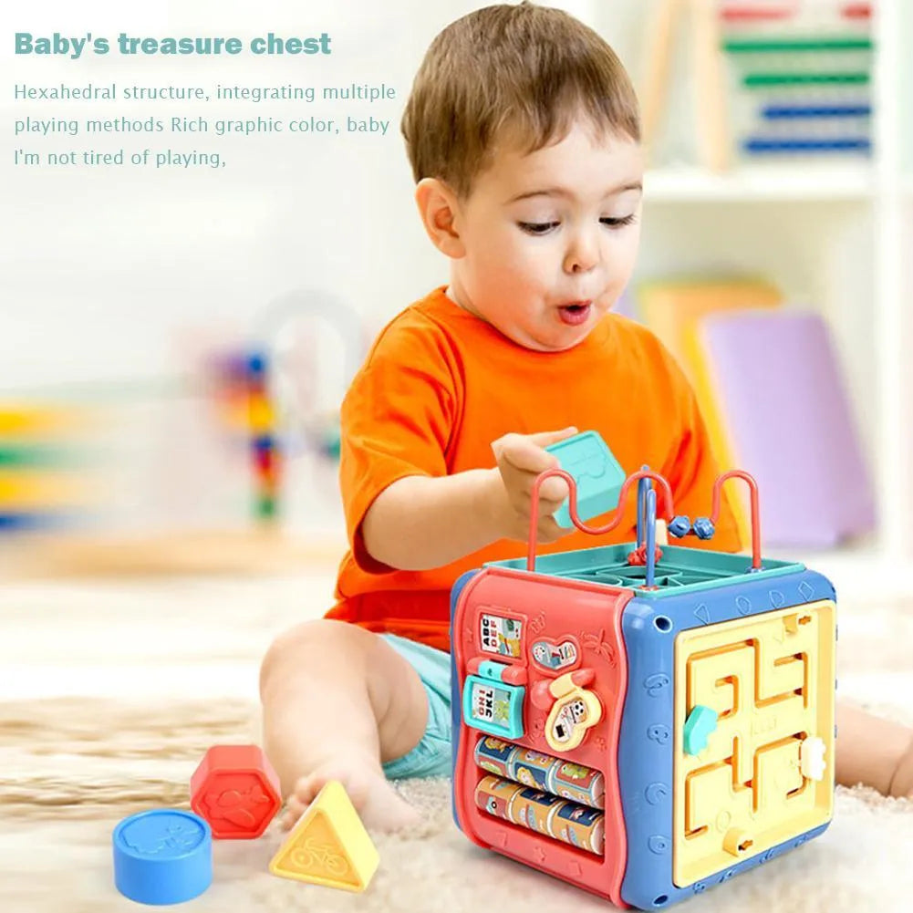 Six-sided baby educational toy cube showing multiple activity faces including bead maze and gear connections