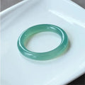 Natural agate wide-tire bracelet showing colour variations and sizing options from 52mm to 62mm