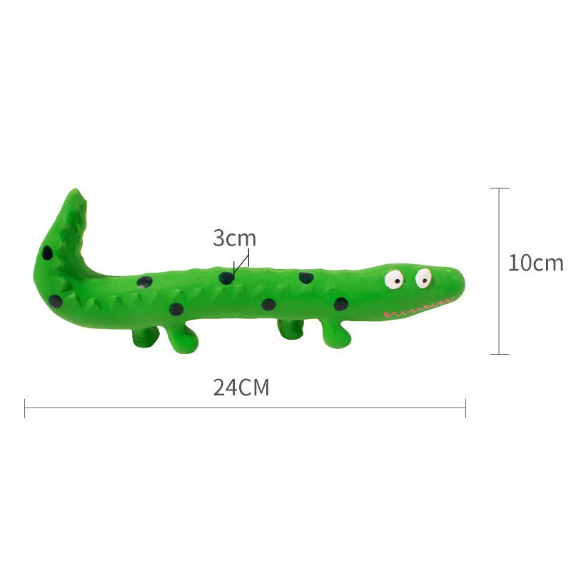 Green cartoon lizard-shaped latex dog chew toy with squeaker on a white background.