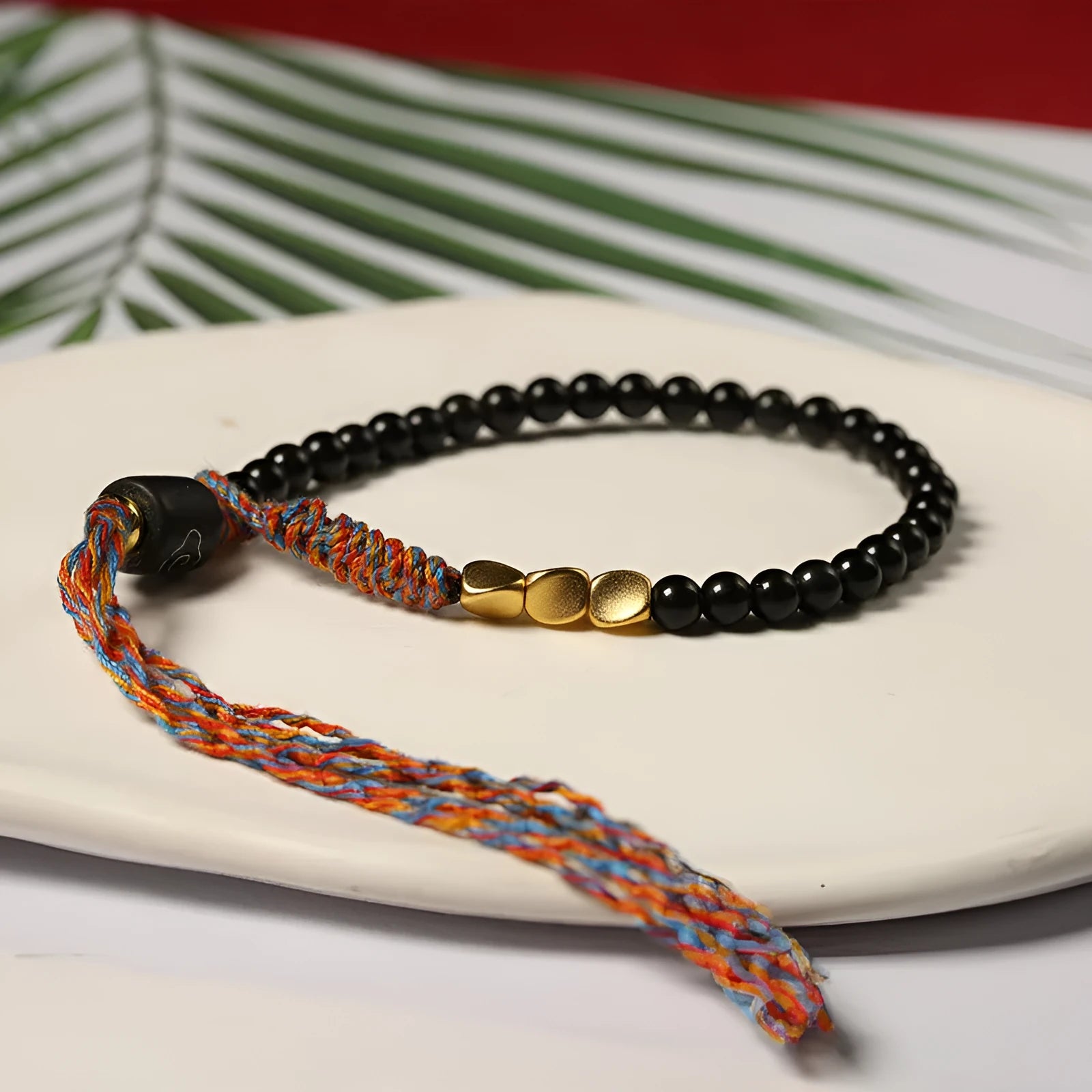 Hand-woven obsidian colour carrying strap bracelet with 4mm width and woven texture