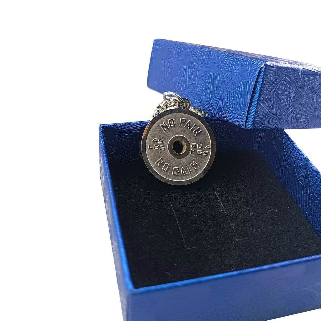 Geometric stainless steel barbell disc necklace with 60cm chain options on jewellery display