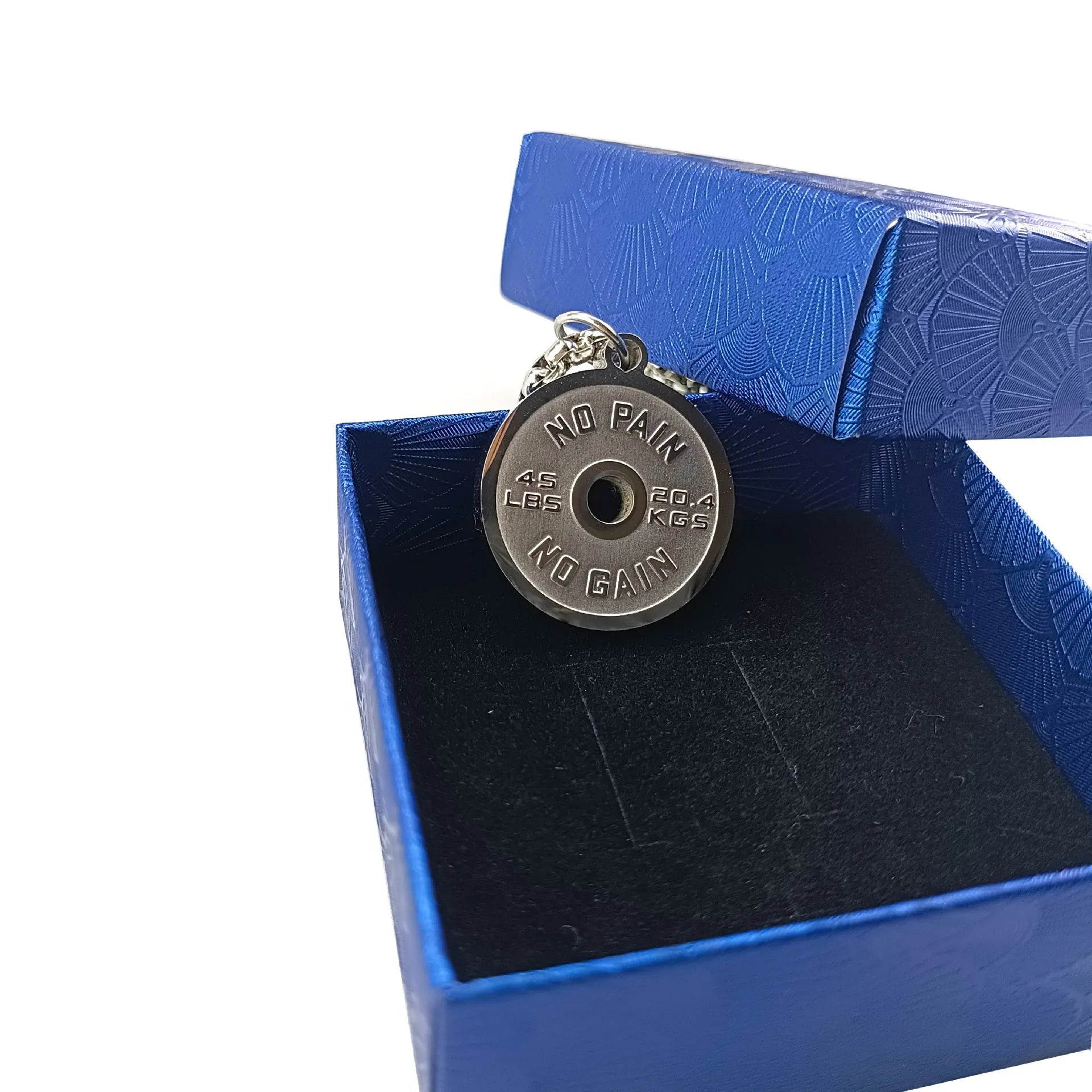Geometric stainless steel barbell disc necklace with 60cm chain options on jewellery display