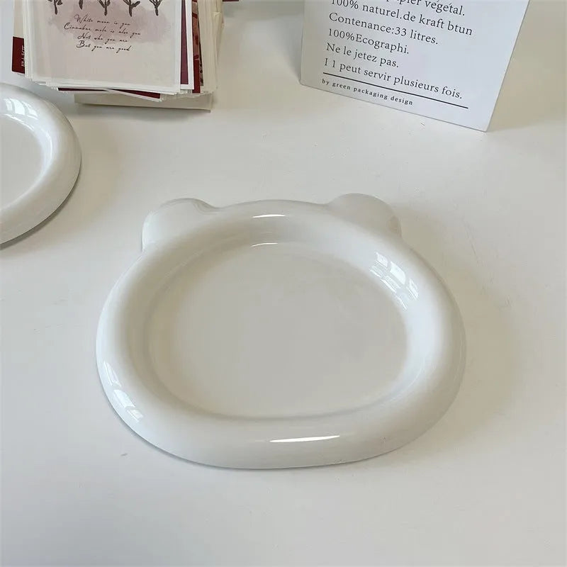 White ceramic plate with ins style bear doodle design, showing 15cm and 20cm size options.