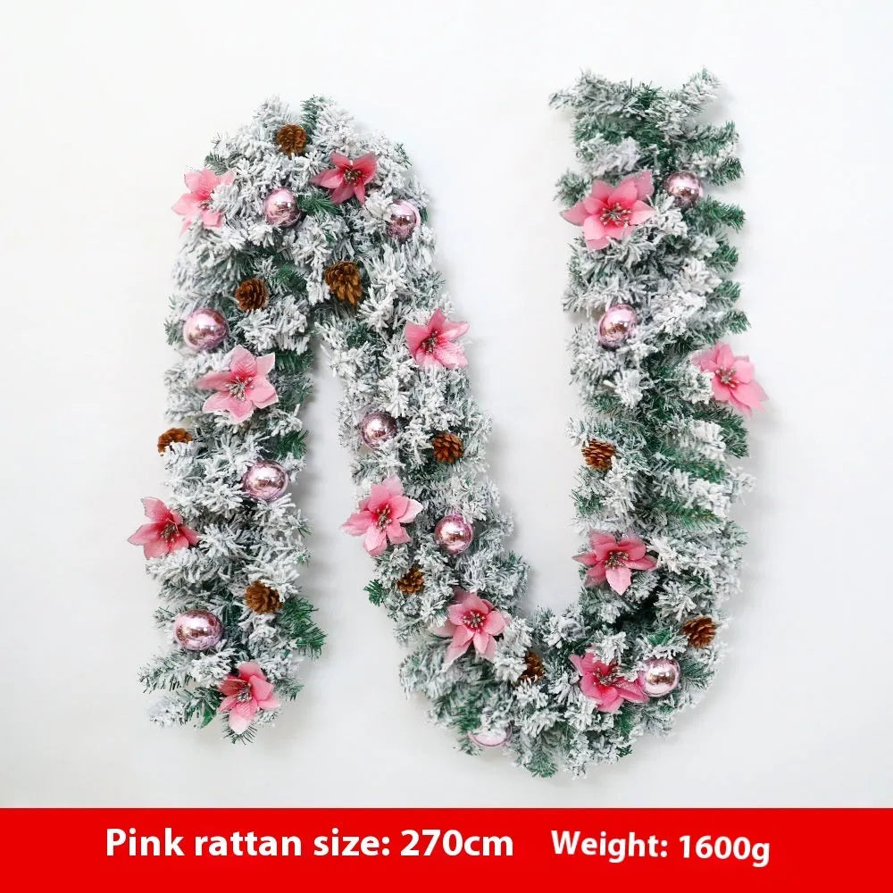 PVC Christmas rattan garland with flocked finish in golden colour option draped over mantelpiece