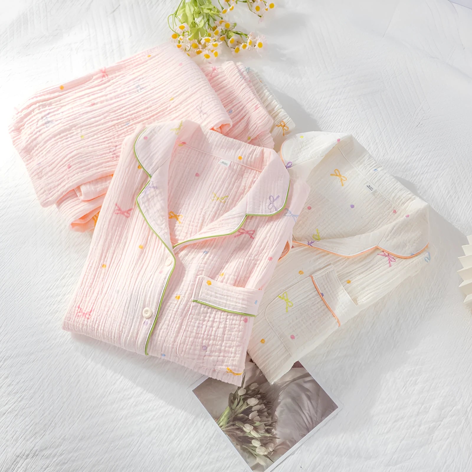 Women's beige cotton pajama set with long sleeves and full-length trousers for home lounging.