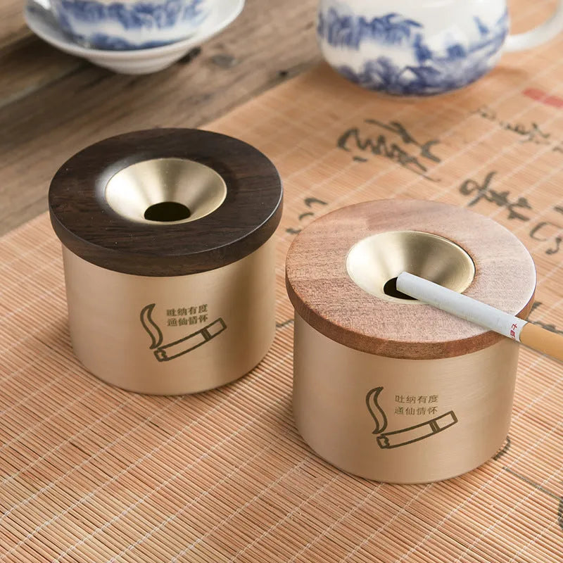 Solid copper retro ashtray with a wooden lid in black or rosewood, showing central air hole.