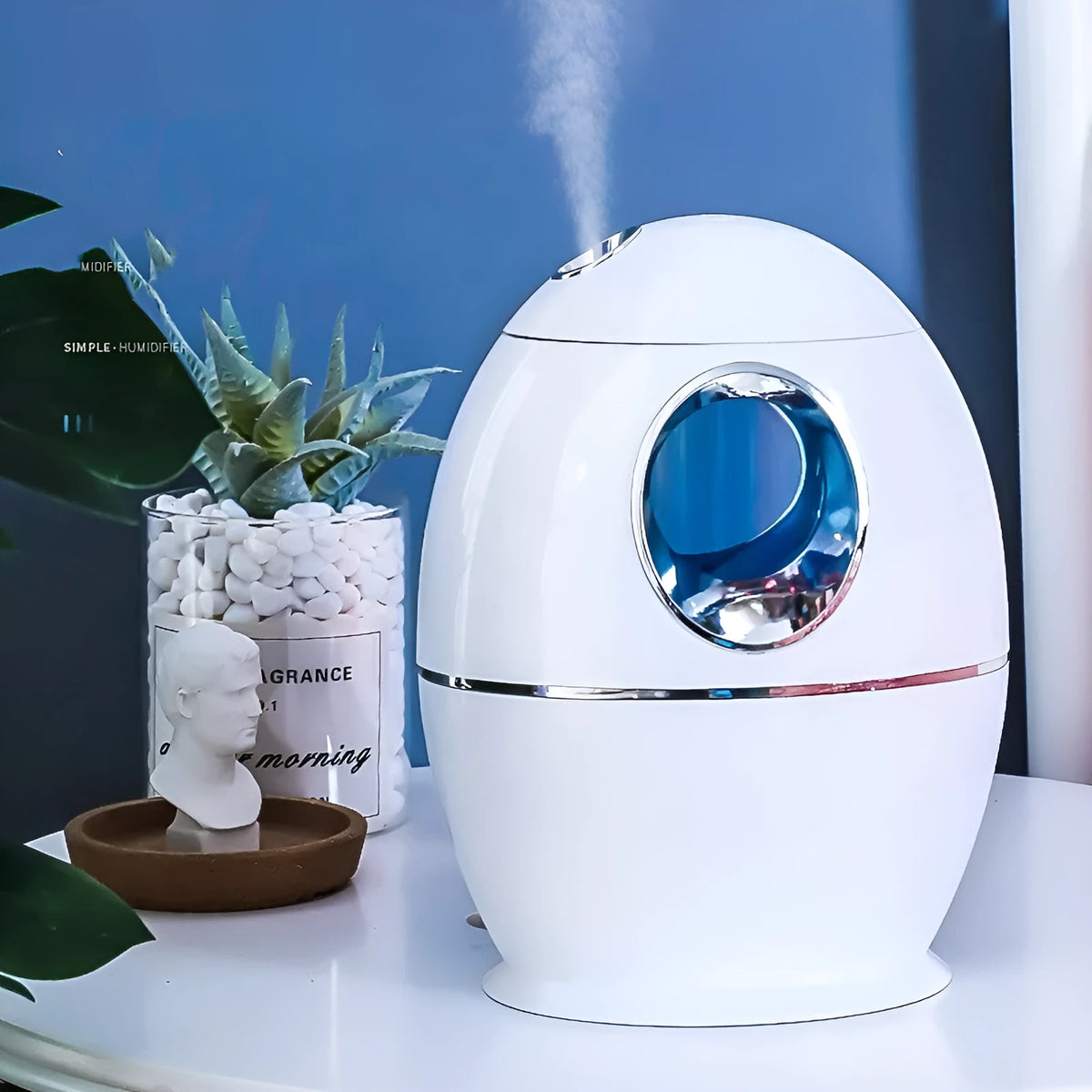 White columnar air humidifier unit with a single mist outlet and a USB cable.