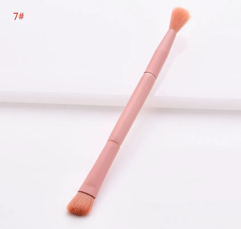 10 professional makeup brushes with wooden handles, including powder, foundation, and double-ended detail brushes.