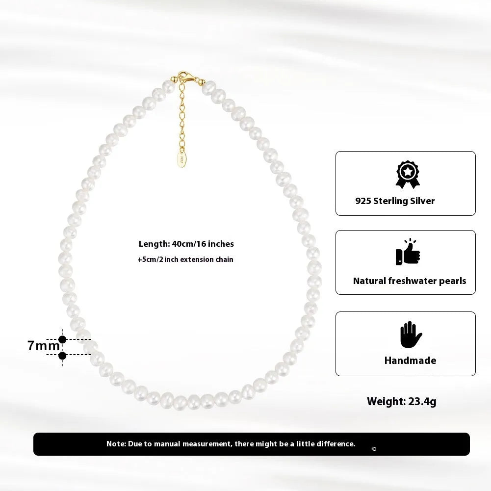 Women's simple adjustable necklace with natural freshwater pearls on a sterling silver chain.