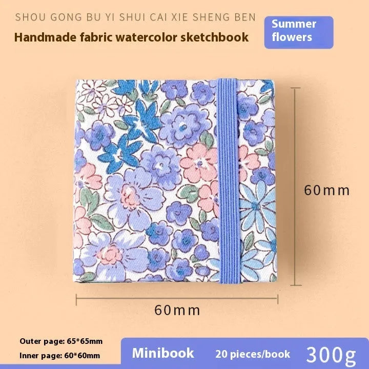 Feiluniao handmade fabric watercolour sketchbook with decorative cover, shown at 185mm length.