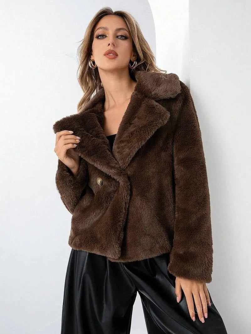 Rose red loose women's faux fur coat with regular sleeves on a hanger