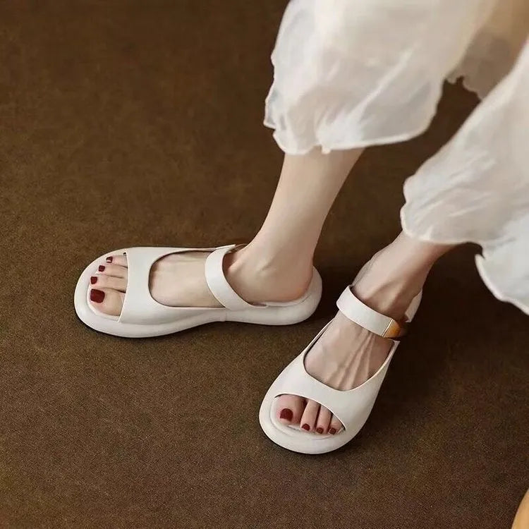 Women's apricot peep toe flat platform sandals made from French soft leather with a rubber sole.