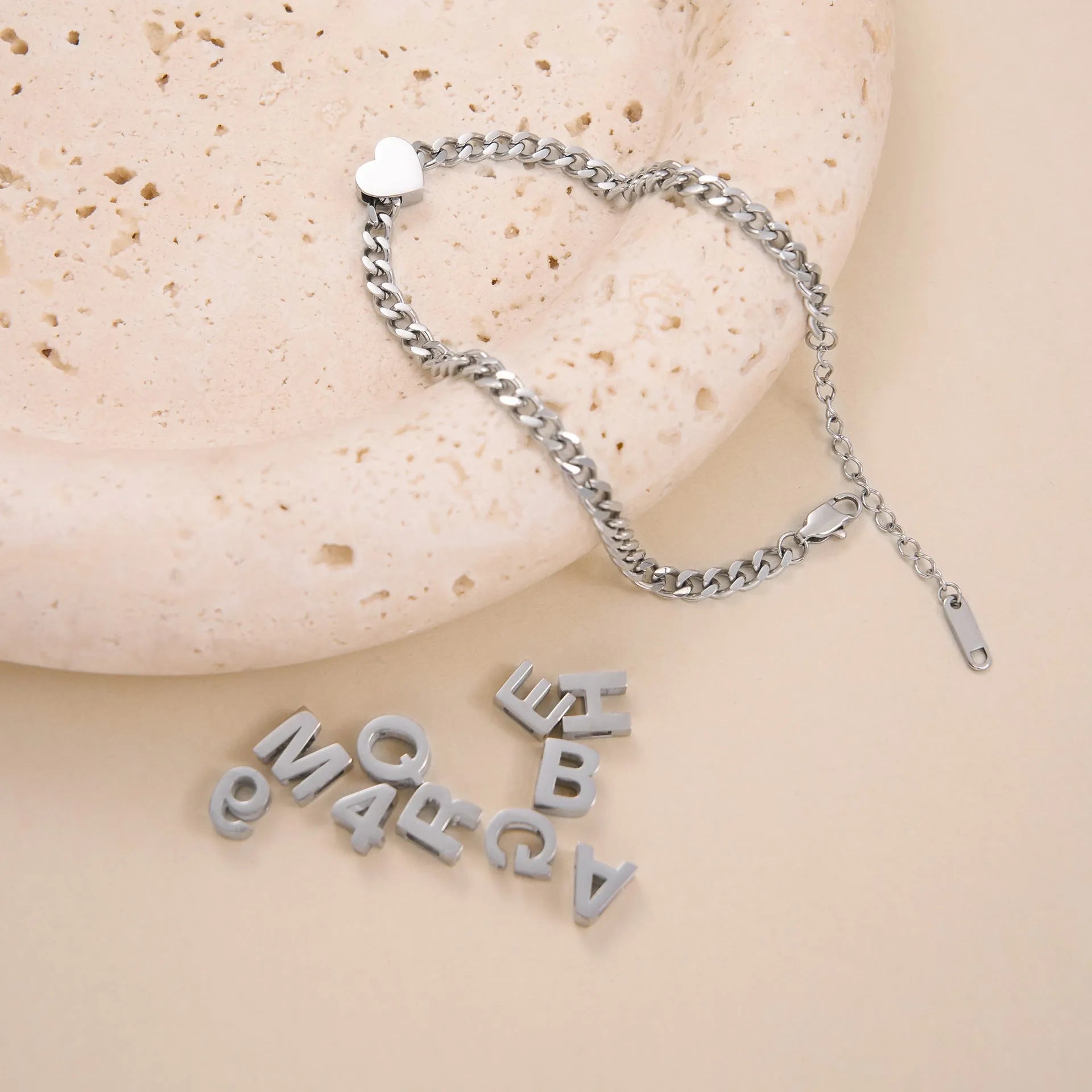 Gold plated titanium steel necklace with the letter A pendant on a 40.5cm chain.