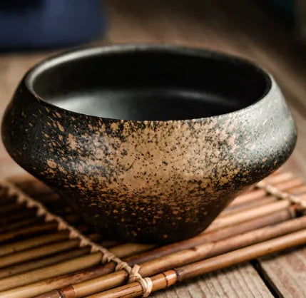 Tall porcelain Japanese soup bowl with stone conch shape and underglaze retro pattern.