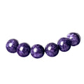 Natural purple and white Charoite crystal bracelet with a platinum metal clasp.