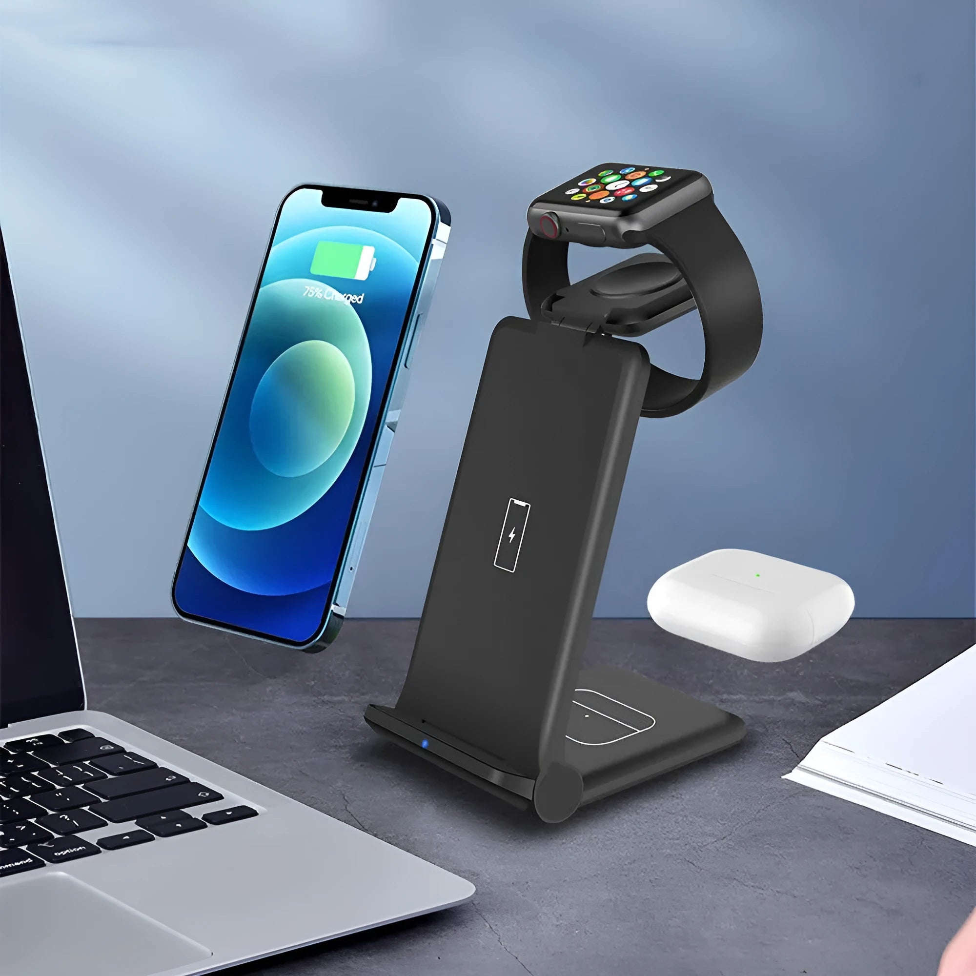White 3-in-1 wireless charging station showing phone, Apple Watch and AirPods charging simultaneously on a desk.