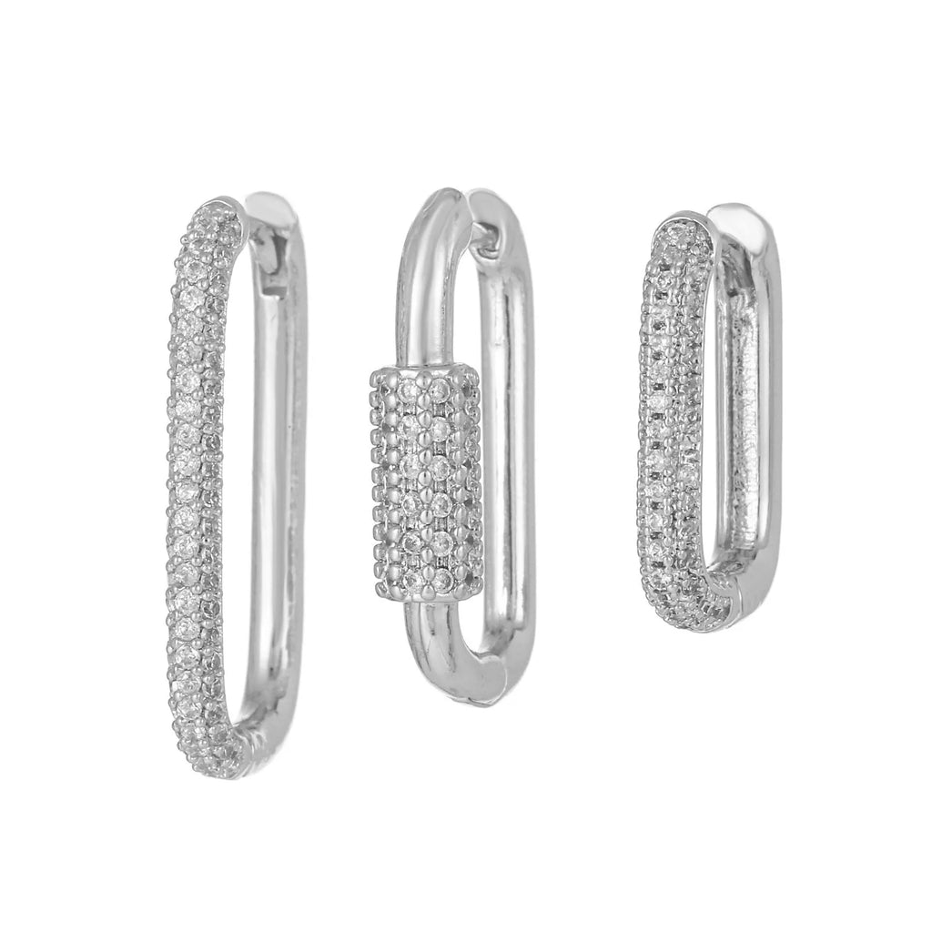 Three geometric ear clips with micro inlaid zircon in gold and white metal colours
