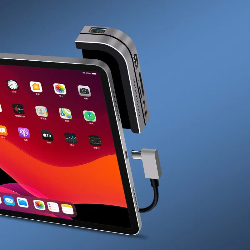 Silver aluminium grey 6-in-1 USB-C docking station for iPad Pro with HDMI and USB ports.