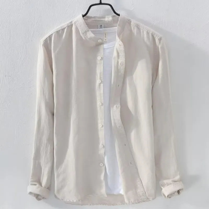 Man wearing a loose fit light blue long sleeve linen casual shirt