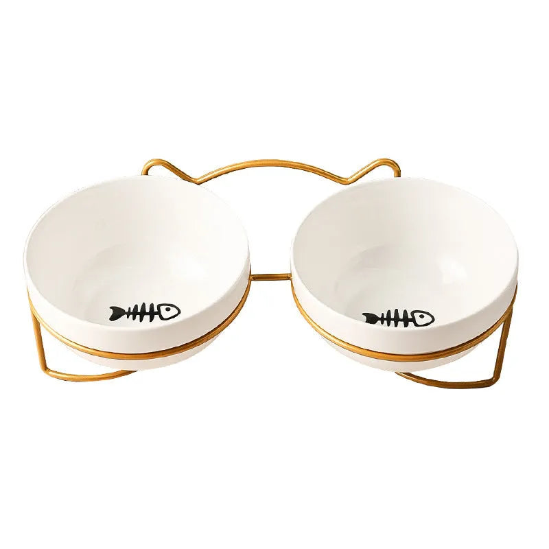 White ceramic cat bowl with cat paw design in black iron frame