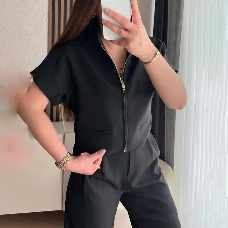 Loose fit casual top with Damascus pattern in black, shown with short sleeves.