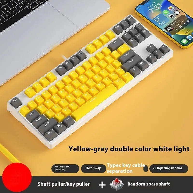 87-key wired mechanical gaming keyboard with multi-colour keycaps on a metal body.