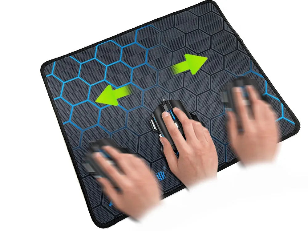 Custom cartoon silk cloth expanded mouse pad with non-slip rubber base, shown in large size on a desk.