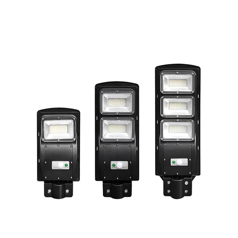 Integrated solar street light with solar panel and LED light in single unit for outdoor areas