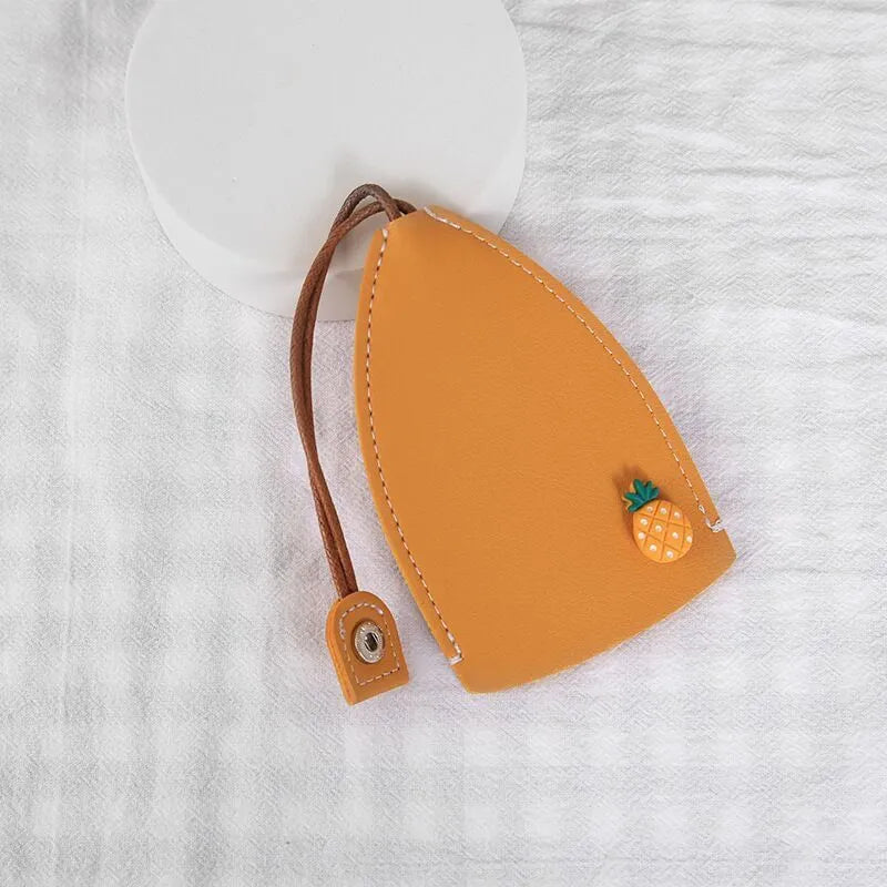 Colourful cartoon pull-out key case made from PU leather showing design options