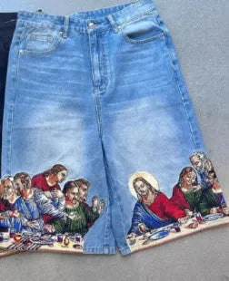Blue men's cotton tapered shorts showing a Jesus print on the back right pocket.