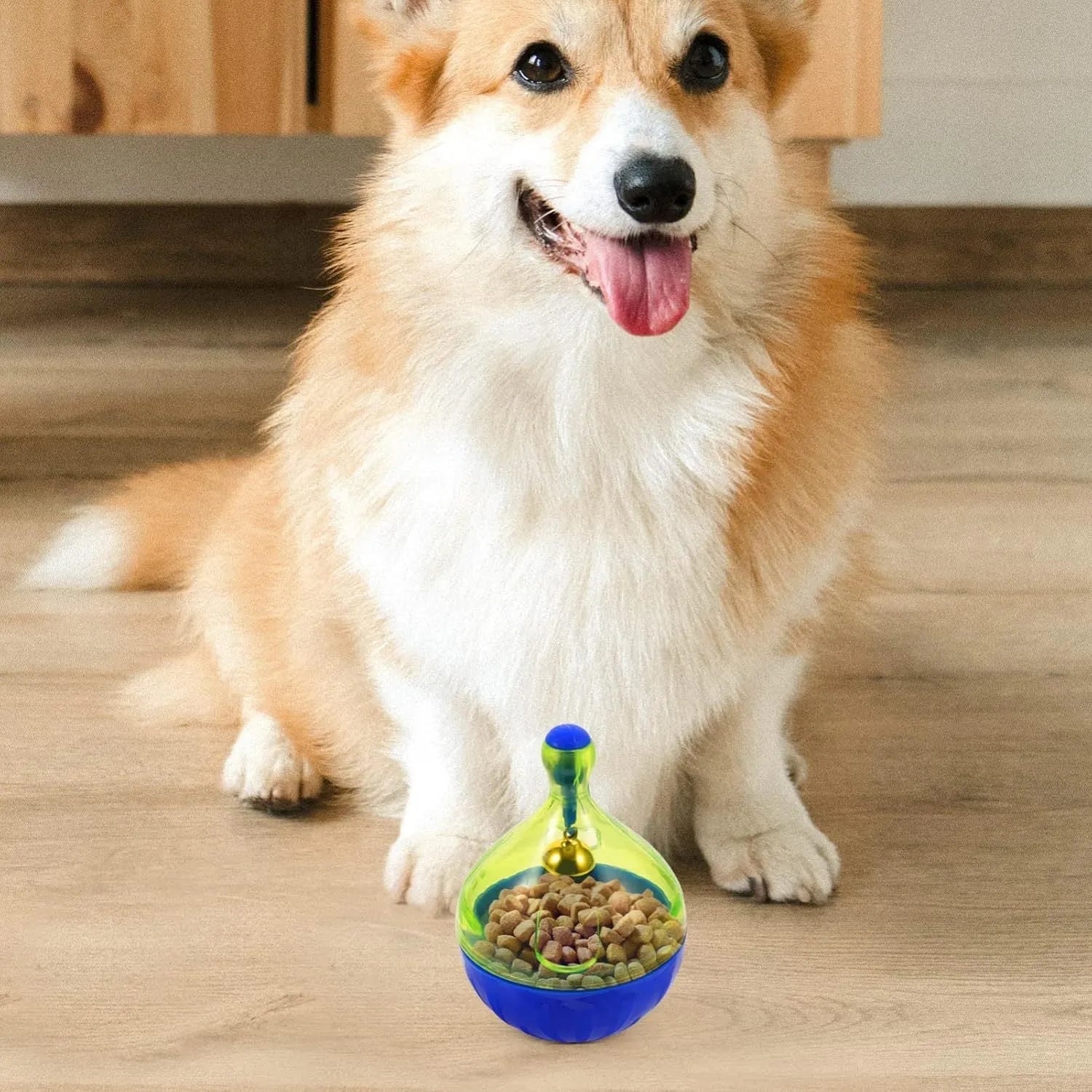 Blue and white tumbler-shaped interactive pet treat dispenser ball for dogs and cats