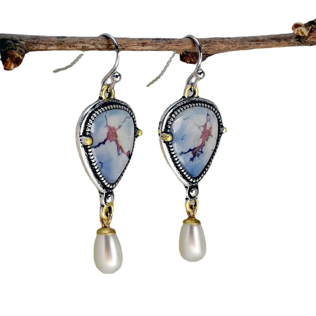 Retro blue drop earrings with geometric design featuring synthetic opal and pearl details