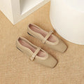 Women's beige mesh low-heel pump with square toe and buckle fastening.