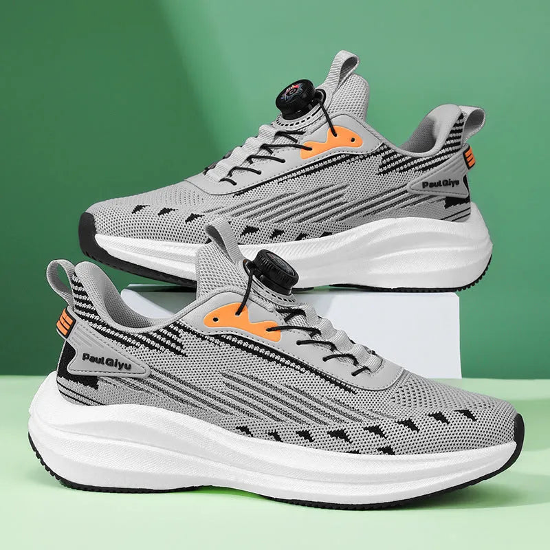 Men's black casual sports shoes with rotating buckle closure and mesh upper on a TPU sole.