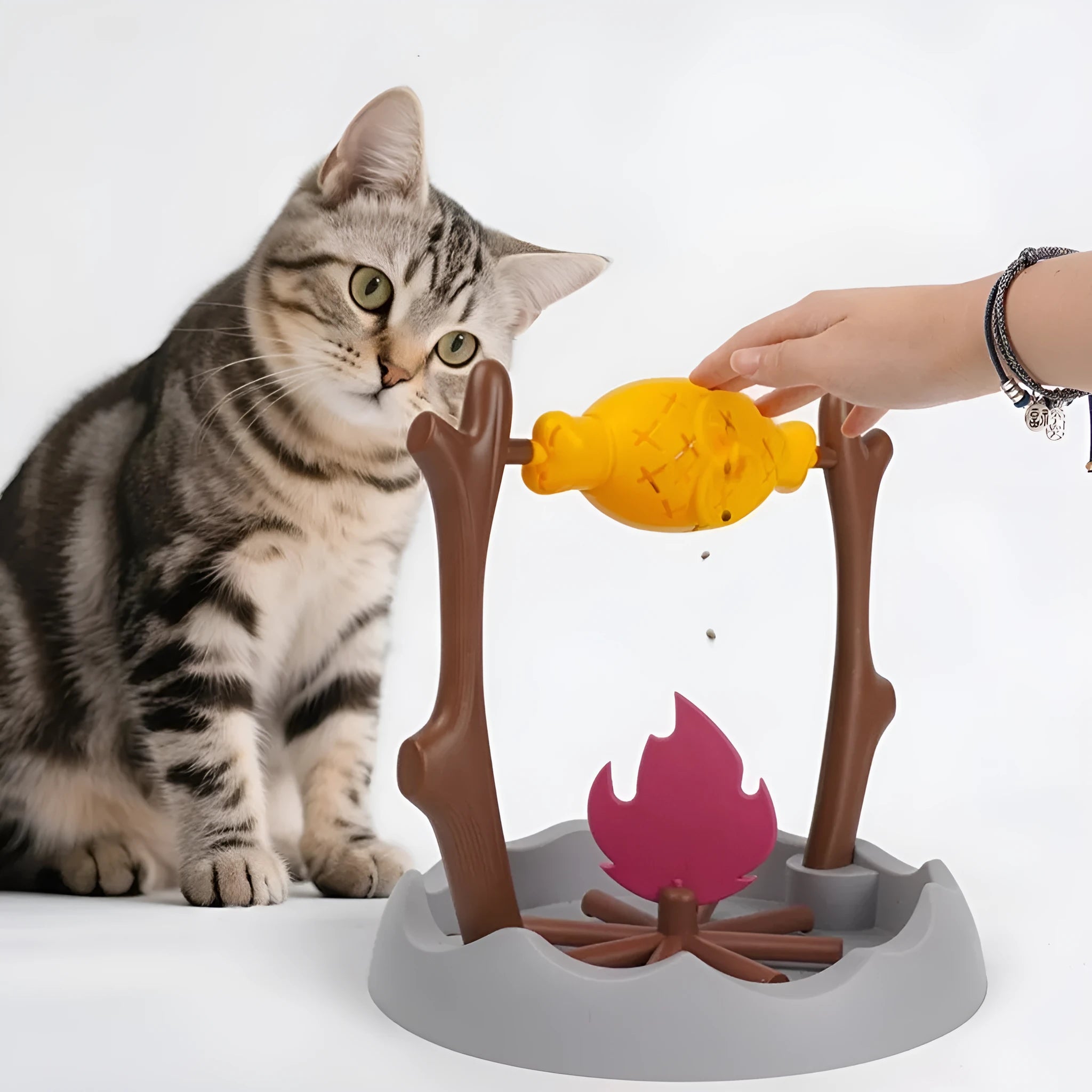 Barbecue-themed tumbling cat feeder toy with leakage food dispensing mechanism