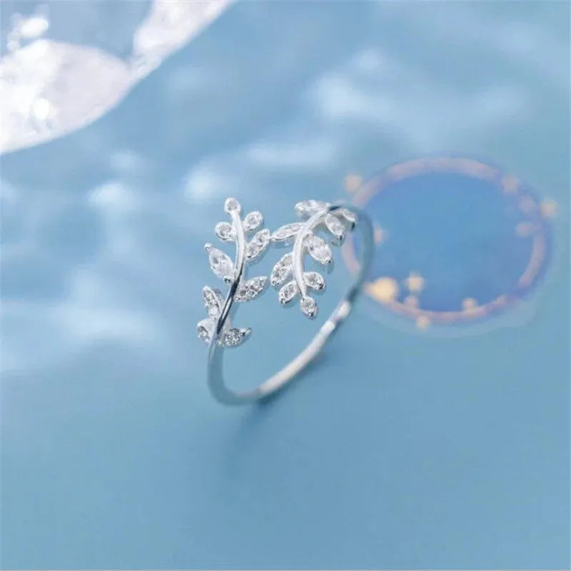 Women's copper branch leaf ring with electroplated gold or silver geometric design