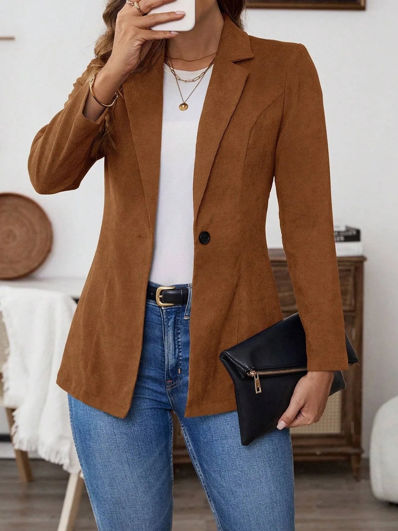Brown men's lapel long sleeve single-breasted leisure suit coat hanging
