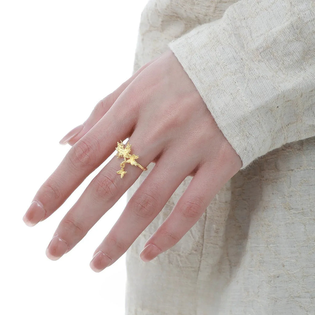 Silver adjustable butterfly ring with electroplated finish in white gold or 18K gold colour.
