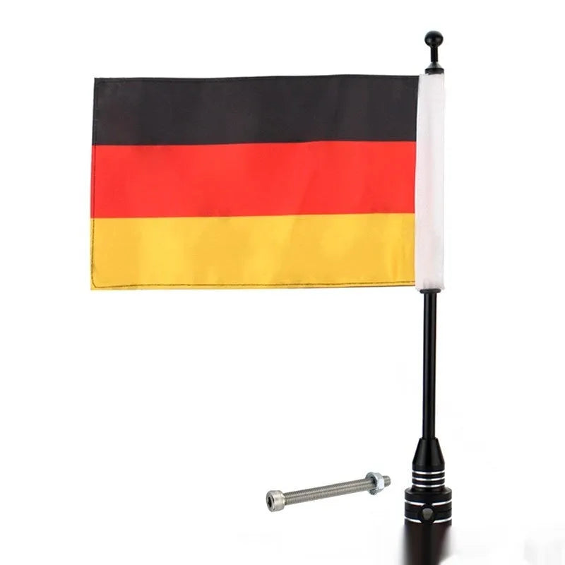 Black and silver motorcycle side box flagpole for mounting on luggage rack or bumper.