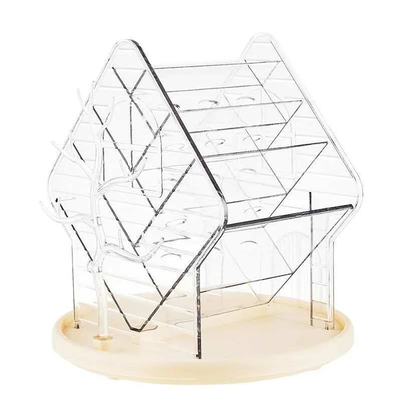 Rotating transparent plastic cosmetics storage box on a countertop.