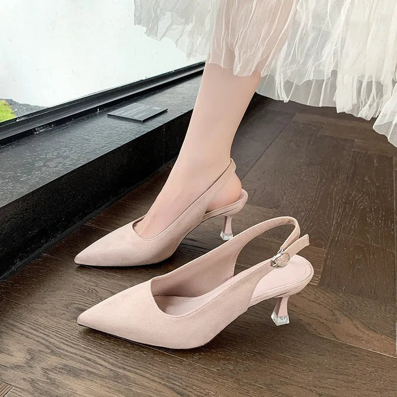 Women's apricot suede pointed toe stiletto heels on white background